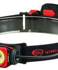 Twin Task 300-Lumen Headlamp With 3AA Batteries, compact red rubber hard-hat strap, shown side view focused on black strap.