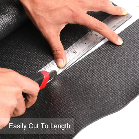 Person cutting Non Slip Foam Rubber Toolbox Drawer Liner 18 Inch By 24 Feet Easy Cut Mat With Grid Lines for quick measuring