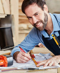Man using Pro Grade Mechanical Carpenter Pencil Set With Built In Sharpener, 18 Refills, Automatic Center Punch And Carbide Scriber