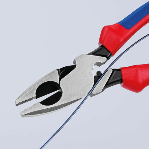 Ultra-High Leverage 9 1/4 Inch Lineman Pliers With Fish Tape Puller And Crimper gripping wire with a comfortable dual-component grip.