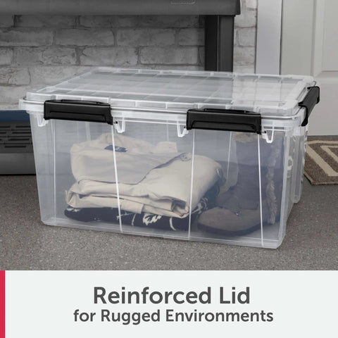 Massive 80 Quart Clear Plastic Storage Bin With Hella Tight Waterproof Seal And Heavy Duty Latches For Stacking Bulky Comforters And Camping Gear In Every Corner, clear storage box with reinforced lid filled with clothing.