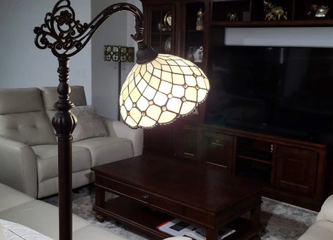 Tiffany Style Floor Lamp With Jeweled Beaded Arched Design illuminated in cozy living room, 62 inch vintage stained glass lamp.