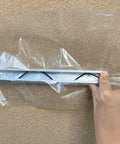 Hands installing Six Point Six Ft Greenhouse Lock Channel And Spring Wire Set With PVC Coated Wiggle Wire on plastic cover