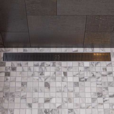 Plug And Play Slick 47 Inch Stainless Steel Linear Shower Drain With Crisp Groove Lines, installed in tiled shower floor.