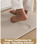 Person standing on Anti Fatigue Kitchen Floor Mat 24 By 94 Inches Wide Runner Rug For Front Sink Easy To Clean Water And Oil Proof Anti Slip Foam Rubber Cushion Cushioned Standing Comfort Durable Doormat For Kitchen And Laundry Dark Beige