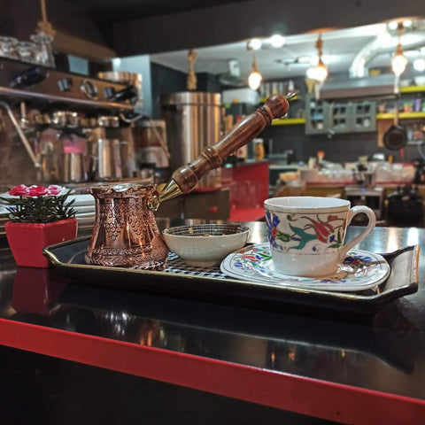 Top Notch Solid Copper Cezve For Turkish Greek Arabic Coffee With Engraved Finish And Wooden Handle 6 Oz Stovetop Pot displayed on countertop