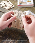 Hands holding Wooden Fidget Creations Set Four Mini Mechanical Puzzles You Build Without Glue Or Tools, stress relief wood puzzle kit