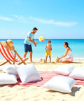 Outdoor Pillow Inserts 18 By 18 Inches Pack Of 2 White No Fuss Water Resistant Throw Pillows on beach with family playing