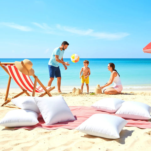 Outdoor Pillow Inserts 18 By 18 Inches Pack Of 2 White No Fuss Water Resistant Throw Pillows on beach with family playing