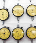 Premium Dial Test Indicator Spare Parts And Hardware Variety Pack With Hella Reliability For Pro Grade Shop Repairs Precision Calibrations And Daily Mechanical Tuning, showing multiple dial indicators with yellow dials.