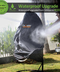 Waterproof Egg Chair Cover For Patio With Zipper 75x45 Inch in garden with water spray demonstrating weatherproof feature.