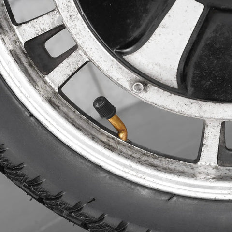Close-up of a wheel with Sixteen Inch Bike Tire With Inner Tube Set 16X2.125 for electric bicycles and motorcycles.