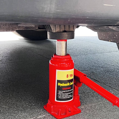 Dual Use Lifting Axle Saddle Adapter Pads, 2 Pack For BMW X3 X5 X6 X7 And Mini, 1.42 Inch Recess on an 8 ton hydraulic jack
