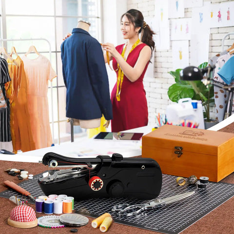 Grab-and-Go Handheld Sewing Machine Kit With 142 Piece Essentials, Wooden Storage Box, Dual Power Supply, Electric Switch, Heavy-Duty Scissors, Assorted Needles And Threads For Quick Home Repairs, with wooden box and tools on worktable