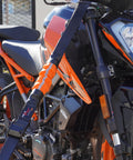 Motorcycle secured with Self Tensioning Tie Down Straps 14 Ft X 1.5 In, 2 Pack With Load Adaptive Tech, No Ratchet Tension, 2250 Lb Break Strength