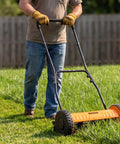 14 Inch Manual Push Reel Lawn Mower With 5 Blade Precision Cutting And Scissor Like Action For Clean Grass Snips, 4 Height Settings For Perfect Lawn Maintenance, Low Effort Yard Work, Quiet And Eco Friendly, orange steel mower on grass