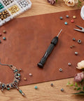 Top Shelf 31 Piece Micro Drill Bit Set With Ergonomic Pin Vise For Tiny Holes In Jewelry Wood Resin And Modeling Projects, shown with tools and beads.