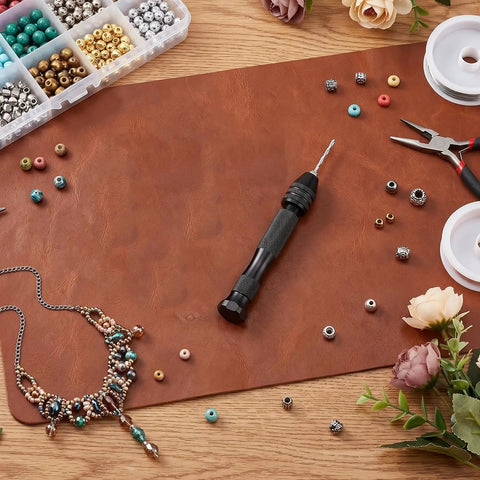 Top Shelf 31 Piece Micro Drill Bit Set With Ergonomic Pin Vise For Tiny Holes In Jewelry Wood Resin And Modeling Projects, shown with tools and beads.