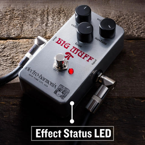 Close-up of Ram's Head Big Muff Pi Fuzz Pedal With True Bypass And Battery Included, Vintage Look And Graphics, LED indicator on.
