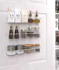 Top Shelf 3 Tier Wall Mounted Metal Rack For Kitchen Pantry Organization Keeps Your Space Slick With Rock Solid Storage For Cans Cleaners And Toiletries In A Clean White Build, featuring jars and bottles.