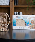 Geared Mechanical Aquarium Model Kit 3D Puzzle Wooden Kit For Adults With Hidden Seahorse, Two Tropical Fish Circling An Algae Forest At Different Speeds, A Mind Bending Brain Teaser For Home Decor And Fun Hobby Set, wooden model on table