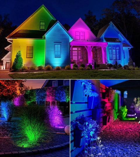Two Pack Outdoor RGBW LED Spotlight Kit With Remote Control illuminating house and garden in vibrant colors at night.