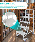 Heavy Duty Four Step Rolling Ladder With Secure Handrails Built Different For Warehouse Spaces Rock Solid Eight Hundred Eighty Pound Capacity Premium Cold Rolled Steel displayed with anti-slip pedal in a library.