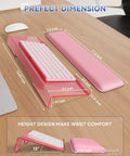 Ergonomic Keyboard Wrist Rest Stand for Desktop With Tilted Riser And Comfy Wrist Pad For Comfortable Typing At Office Home Or School Pink For All Day Comfort, pink acrylic riser with foam pad, dimensions shown on a desk