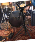 Built Tough Portable Alloy Drum Rack With Smooth Adjustment Snare Stand and Quick Release Practice Pad Rack in a rehearsal setting.