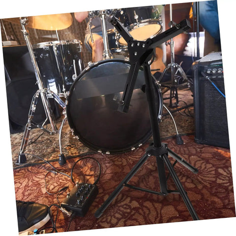 Built Tough Portable Alloy Drum Rack With Smooth Adjustment Snare Stand and Quick Release Practice Pad Rack in a rehearsal setting.