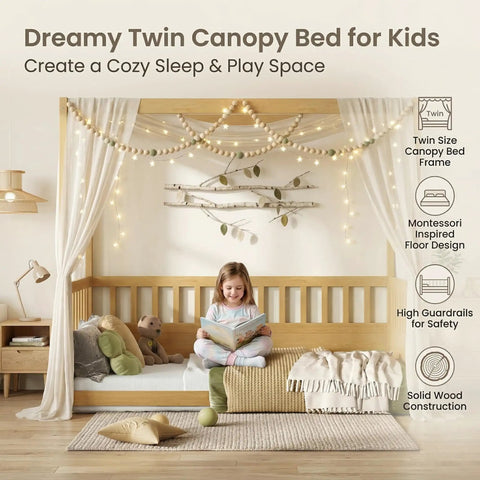 Twin Size Canopy Bed Frame With Four Posters And High Guardrails For Kids Montessori Floor Bed Natural Wood cozy setup with lights, curtains, and child reading.