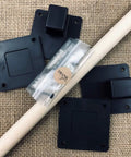 Components of Banister To Wall Stair Gate for Kids and Pets, including brackets and rod, no drill required, made in USA.