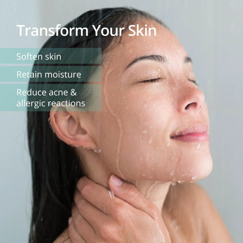 Woman enjoying shower with Shower Filter That Cuts Ninety Percent Of Chlorine For Softer Skin And Healthier Hair, eyes closed, relaxed.