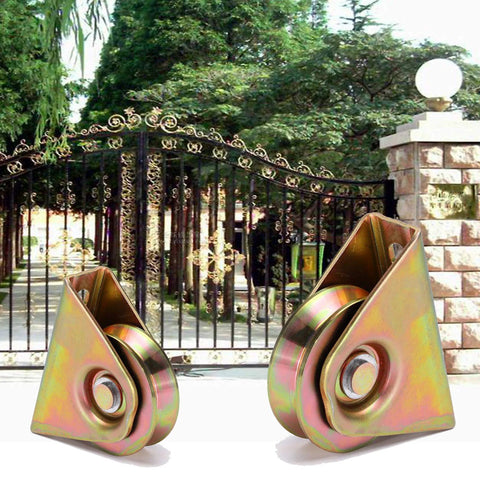 Two 2in V-groove wheel plate casters with brackets, gold zinc-plated metal for sliding gates.