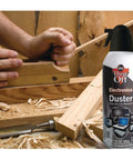 Two Pack 10 Oz Compressed Gas Dusters for quick cleaning of electronics like keyboards CPUs mice workstations next to wood shavings.