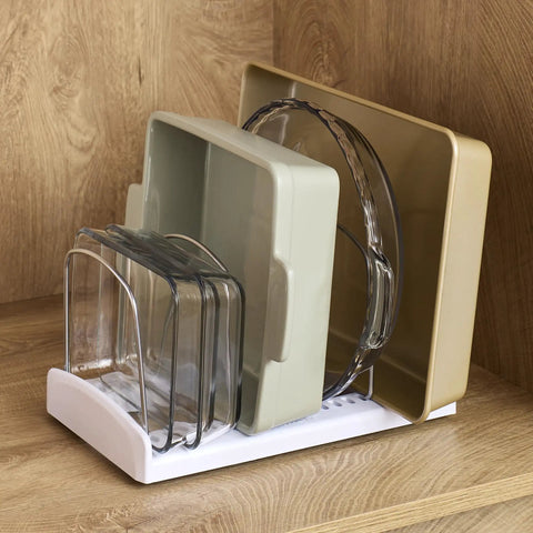 StoreMore Adjustable Bakeware Rack with steel wires, organizing cookie sheets, pans, and trays in kitchen cabinet, seven dividers visible.