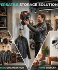 Man uses Six Pack Motorcycle Helmet Rack Wall Mount With 180 Degree Rotation And Dual Hooks for helmets and jackets in garage.