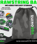 Tough As Nails Heavy Duty Ratchet Straps Tie Downs 4 Pack 1 Inch Wide By 15 Feet Long Featuring Quick Release S Hooks For Securing Luggage And Hauling Gear Without Any Hassle Today, gray drawstring bag displayed with stickers.