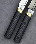 Close view of Tactical Wakizashi Full Tang Fixed Blade Knife, G10 handle, brass guard, Sleipner steel blade with markings.