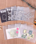 36 Piece Magnetic Sheets And Die Storage Bags Set showcasing clear bags with stamps, stencils, and magnetic sheets for card making.