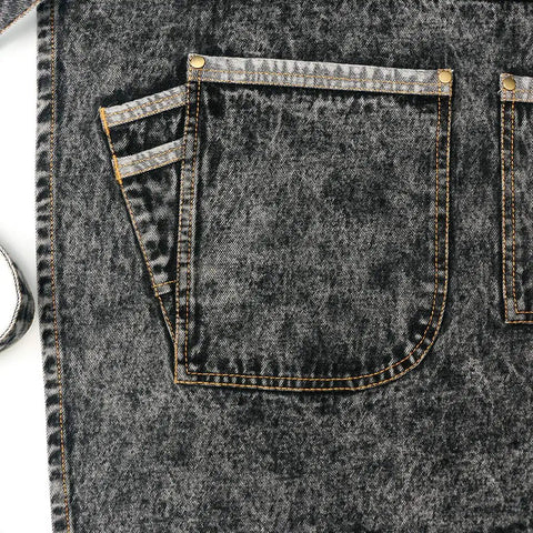 Close-up of pocket on Denim Hair Stylist Tool Apron With Pockets For Women Cross Back Straps Adjustable Size S To M Black Durable Denim Work Apron