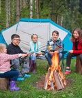 Group of people around campfire using 32 Inch Telescoping Marshmallow Roasting Sticks Set For Campfire Open Fire Pit S'mores Skewers