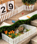 Three Piece 35 Inch White Mini Christmas Garden Fence For Fairy Gardens And Dollhouses Wood Picket Ornament Fence in use