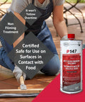 Hella Strong Solvent Based Color Enhancing Stone Sealer in a one liter bottle, applied on outdoor tiles by a person.