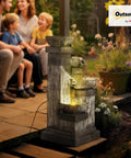 Four Tier Outdoor Water Fountain With LED Lights, 33.5 Inch Tall Resin Cascading Bowls Waterfall in a garden setting.