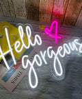 Hello Gorgeous Pink Neon Sign Light For Home Decor And Party Vibes LED Neon Strip Wall Art on a wooden surface