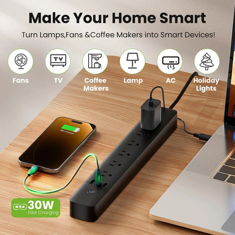 The Real Deal Smart Plug Power Strip With Six Individually Switched Outlets And Three USB Ports Offering Thirty Watt Fast Charge Surge Protector Alexa And Google Home Compatible Energy Monitor Six Foot Cord on desk with devices.