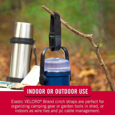 Elastic Cinch Straps With Buckle Two Pack For Cables And Gear holding a blue water bottle on a branch in outdoor setting