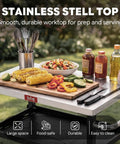 Three Tier Outdoor Grill Cart With Rolling Pizza Oven Table And Stainless Steel Top 26.6 By 16.1 Inches Heavy Duty Steel Stand For Pizza Ovens And Griddles Outdoor Bar Cart With S Hooks For Patio Parties Deck Dining And Camping featuring a stainless top with food ingredients.