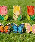 Spring Wood Cutouts Painting Kit 6 Pack Tulip And Butterfly Shapes Unfinished Blank Wood Slices on green grass
